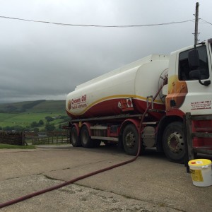 Side view of fuel tanker at the farm